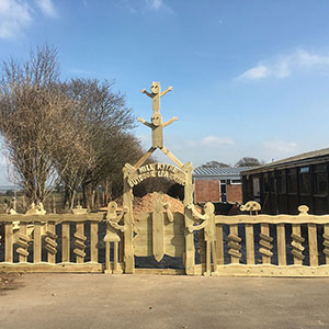 wooden carved bespoke fencing